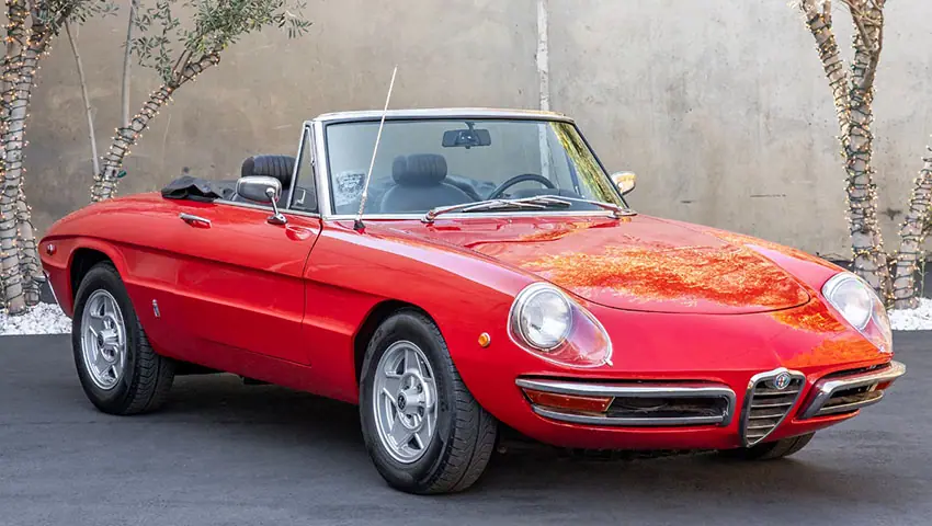 red vintage Alfa Romeo 1600 Spider 1965